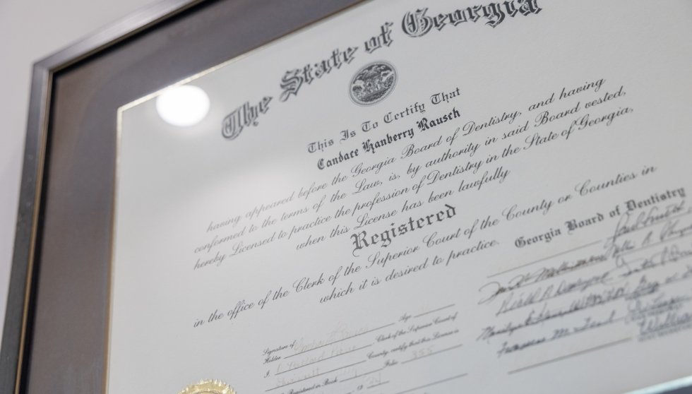 Close up of framed certificate for Doctor Candace Rausch to practice dentistry in the state of Georgia