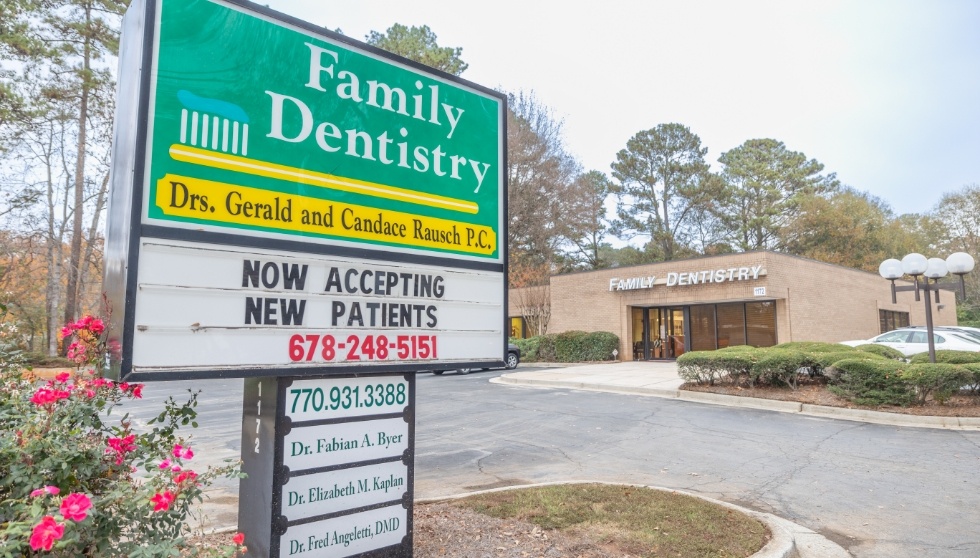 Sign outside of Rausch Family Dentistry office building