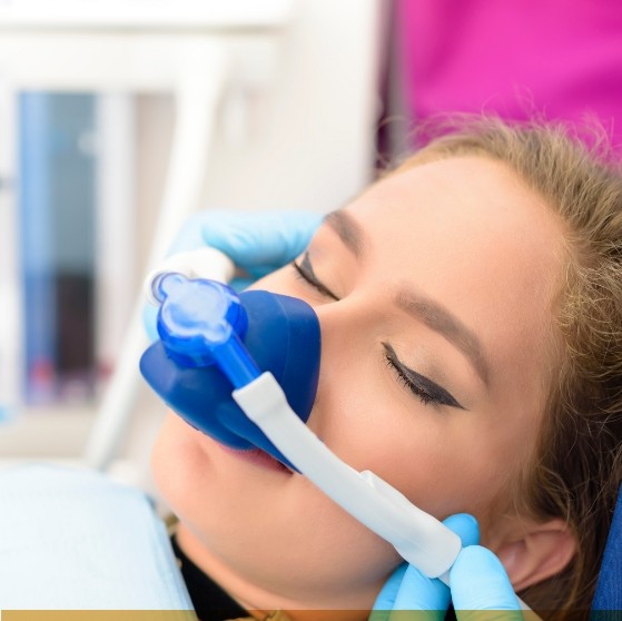 Dental patient with nitrous oxide mask on